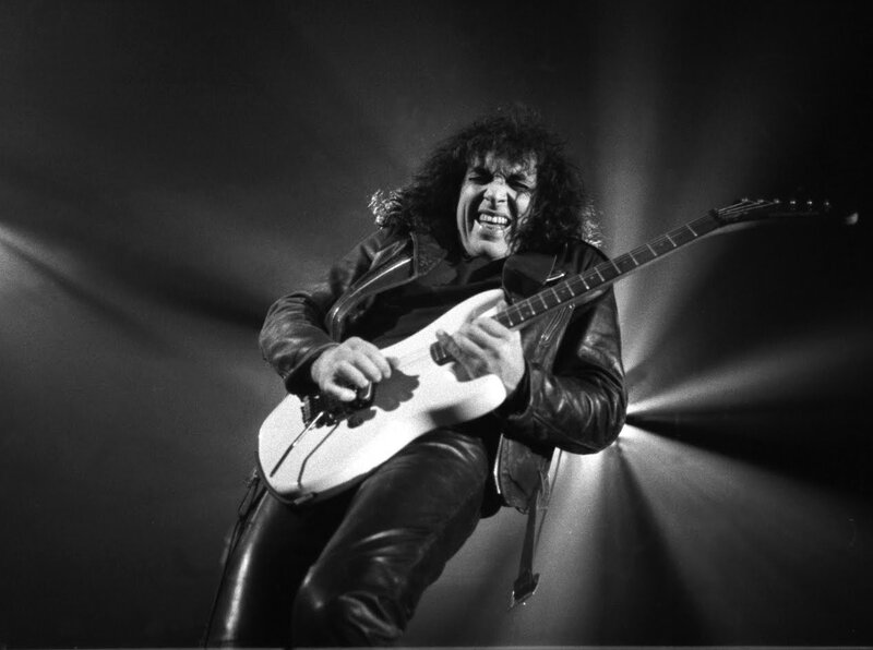 Guitarist performing on stage