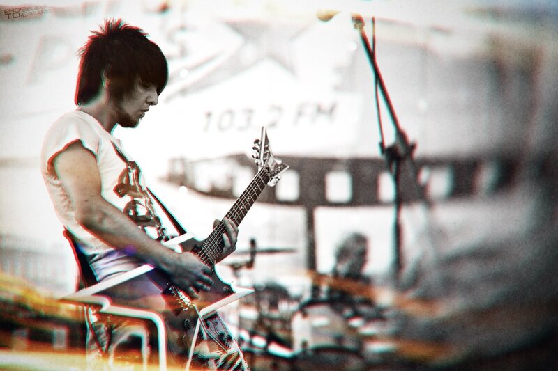 guitarist performing on stage