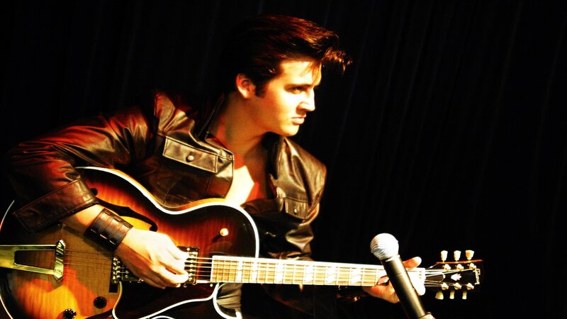 guitarist performing on stage
