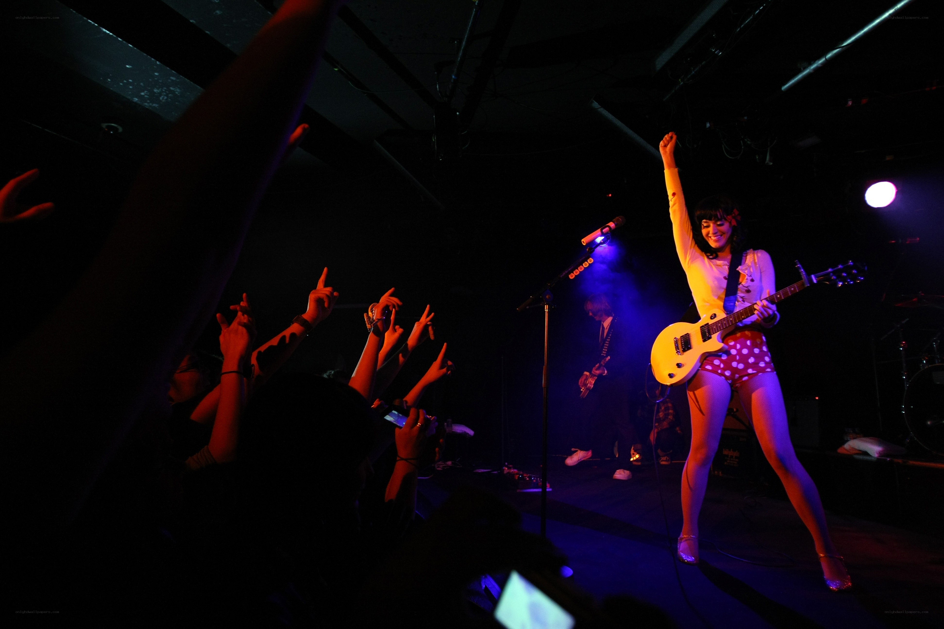 Guitarist performs on stage