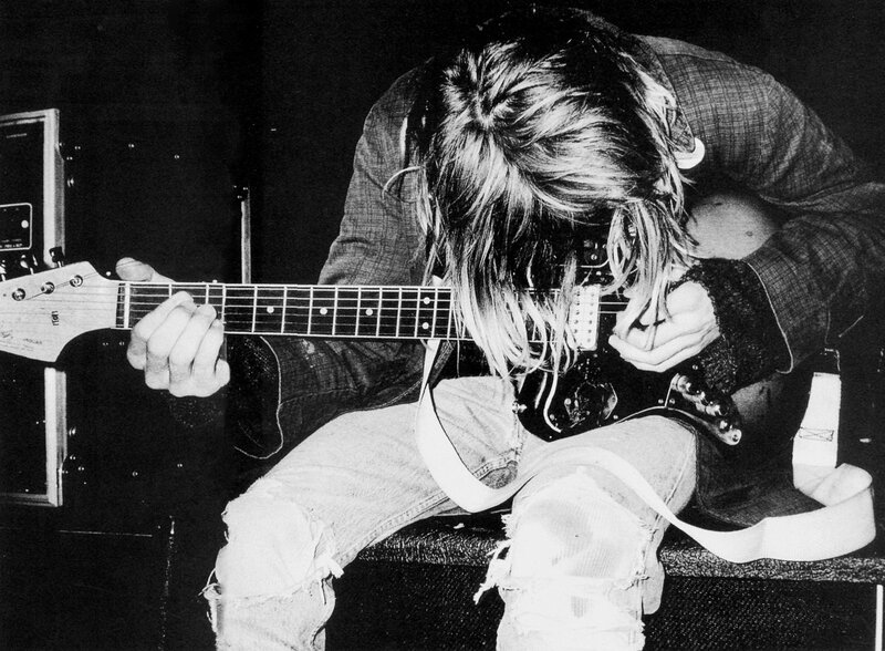 guitarist playing electric guitar