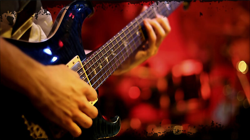 guitarist playing electric guitar