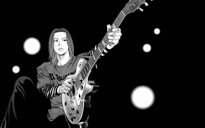 guitarist playing electric guitar