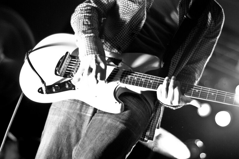 guitarist playing electric guitar