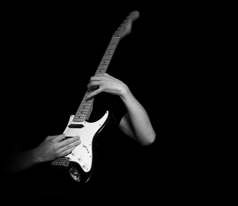 guitarist playing electric guitar