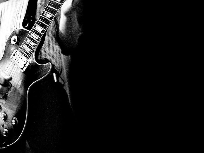 guitarist playing electric guitar