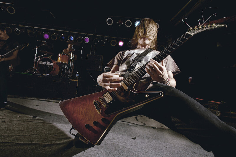 Guitarist Playing Electric Guitar — Black