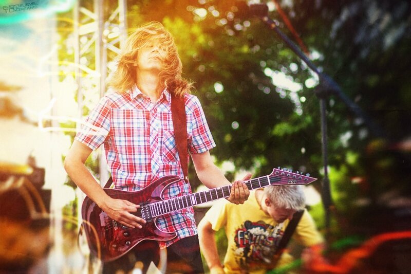 Guitarist Playing Electric Guitar — Red