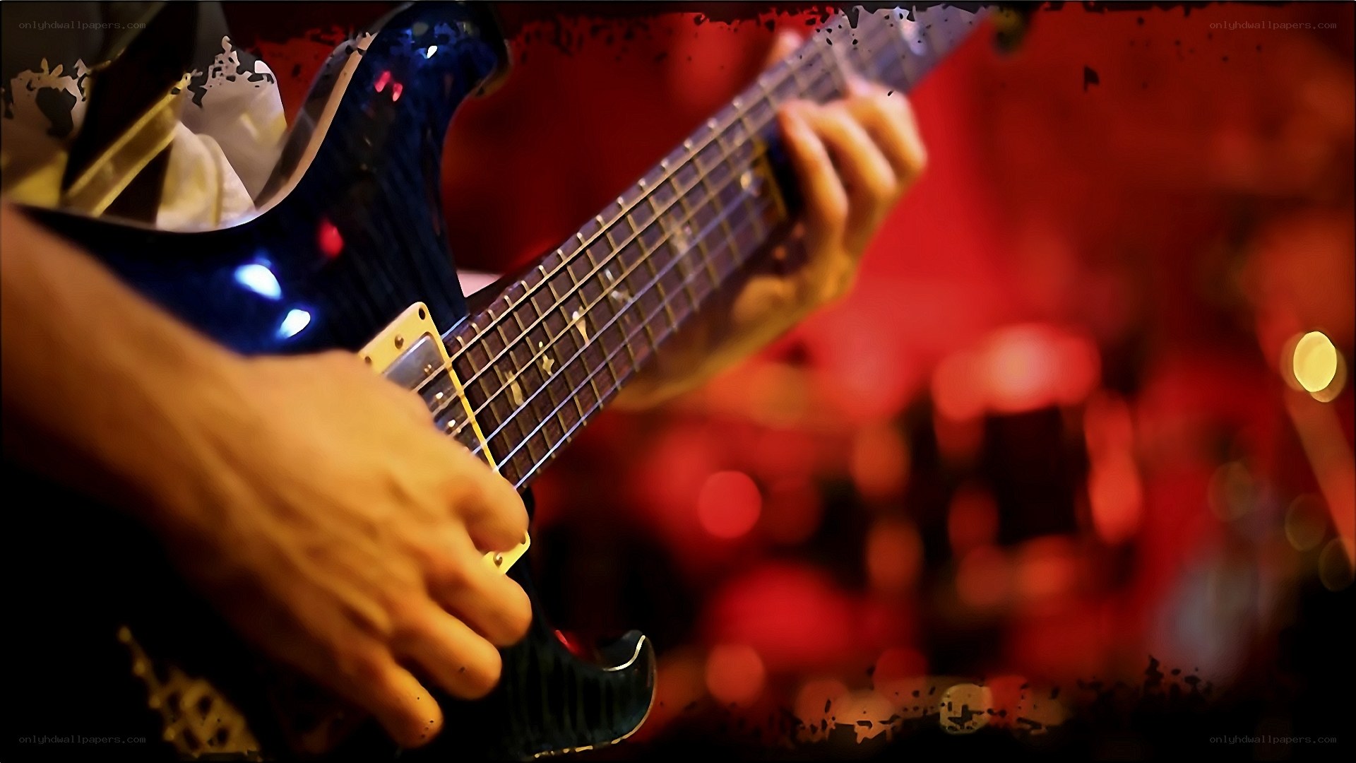 guitarist playing electric guitar