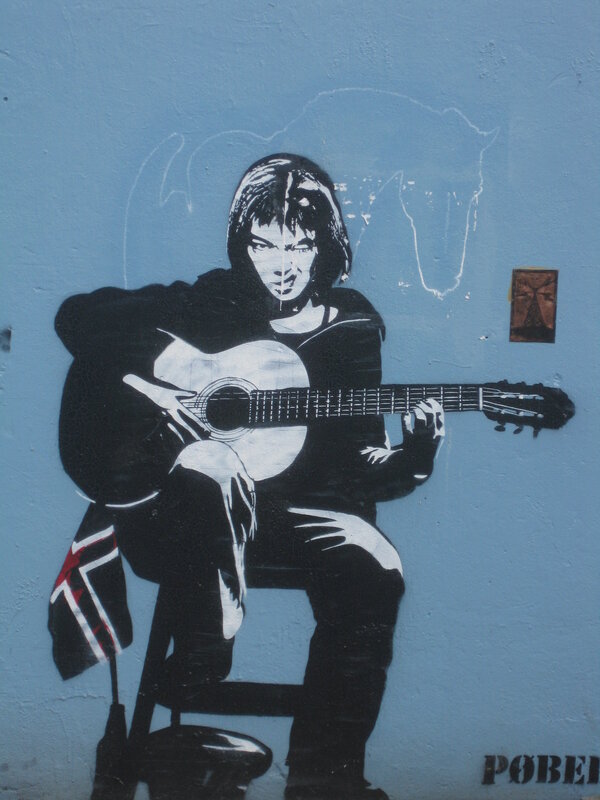 Guitarist street art mural