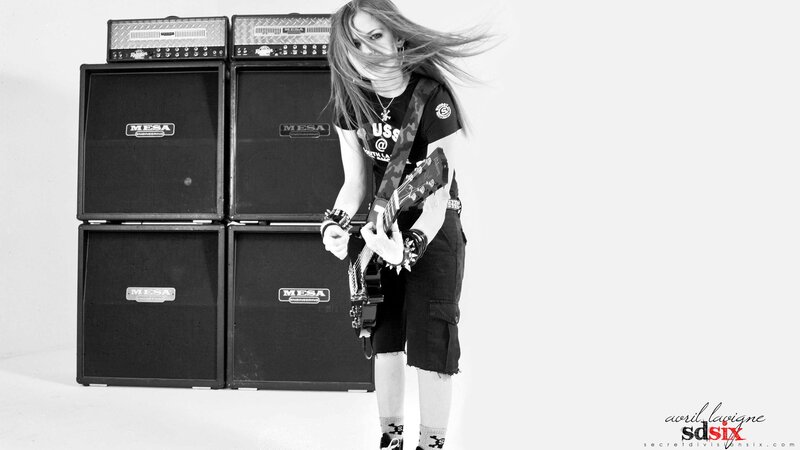 guitarist with amplifier stack