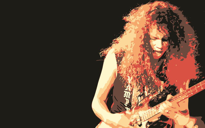 guitarist with curly hair