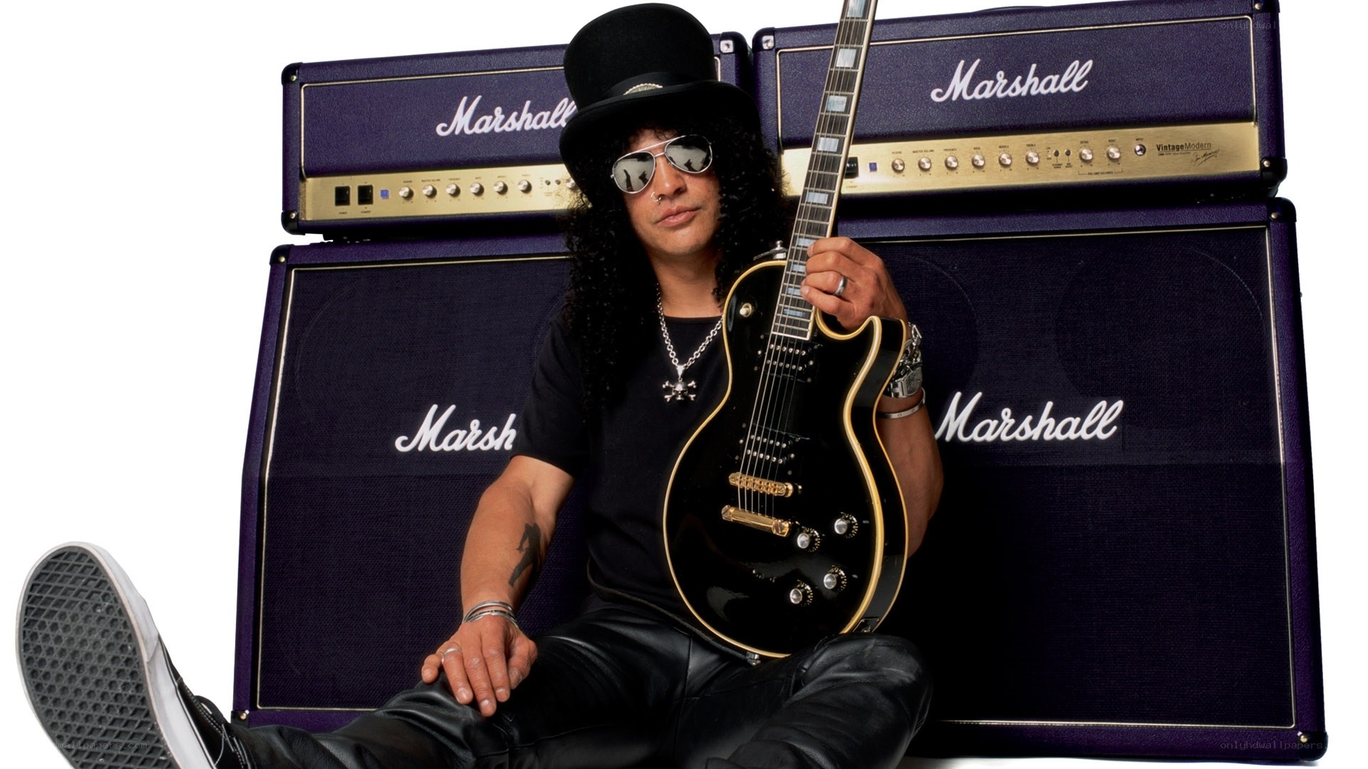 Guitarist with Marshall amps