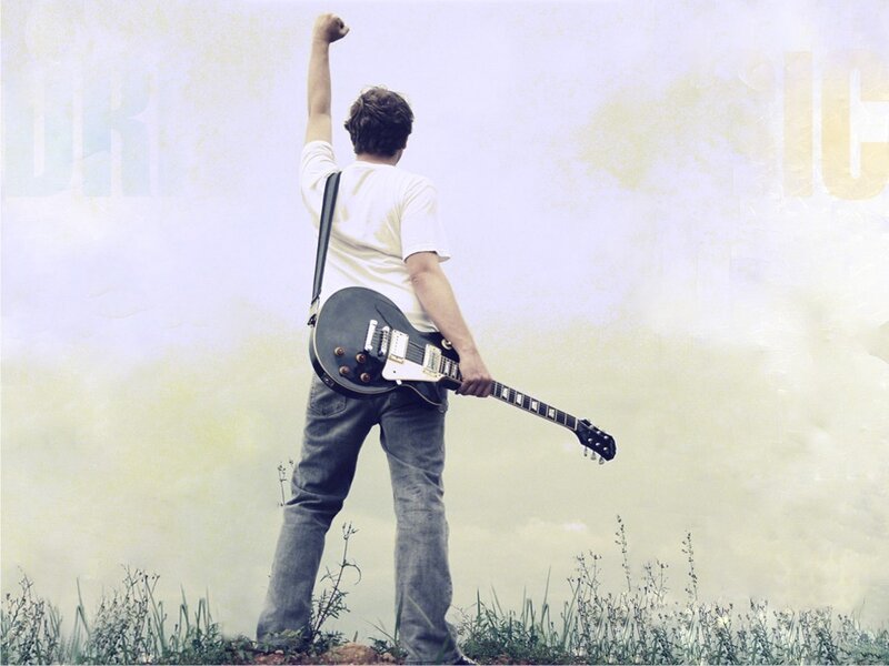 guitarist with raised fist
