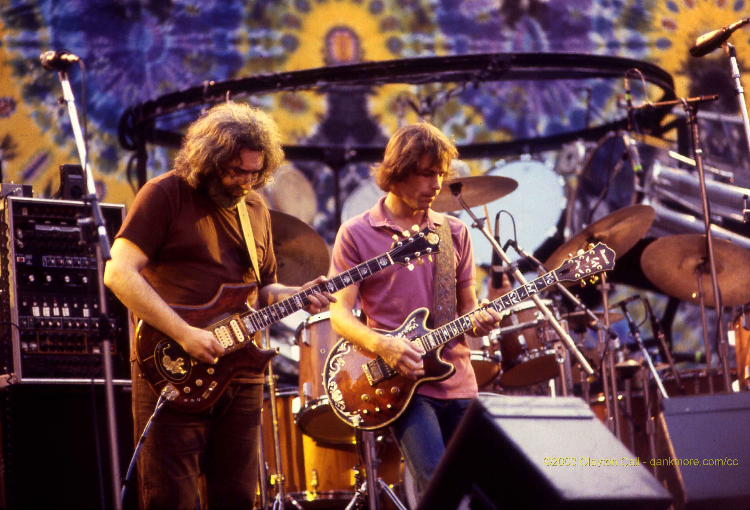 Guitarists performing on stage