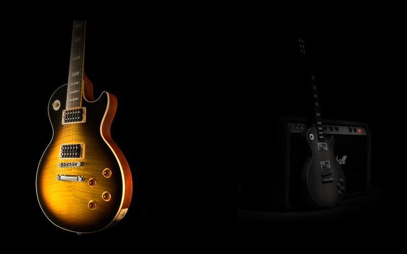 guitars and amplifier in dark