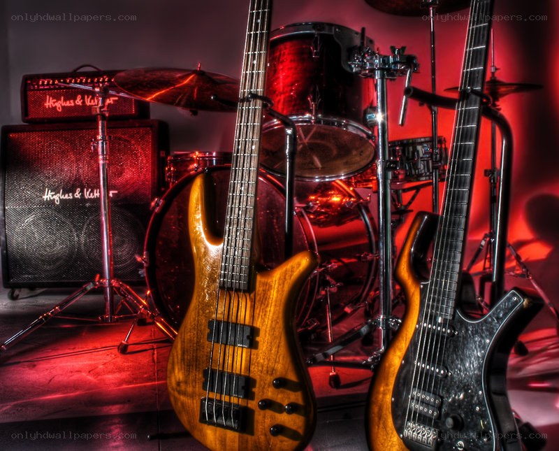 Guitars and drum set on stage