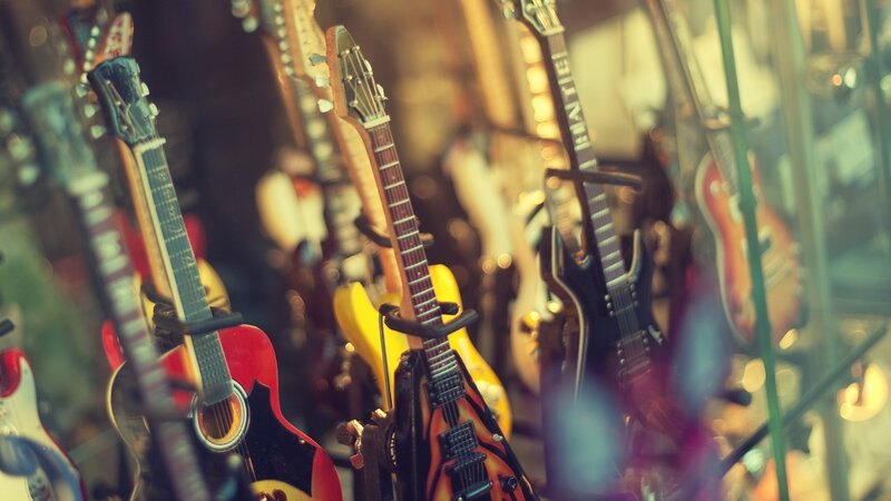 Guitars in a display case