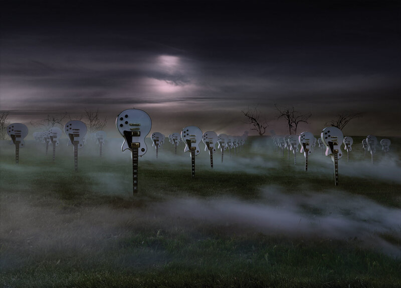 Guitars in a foggy field