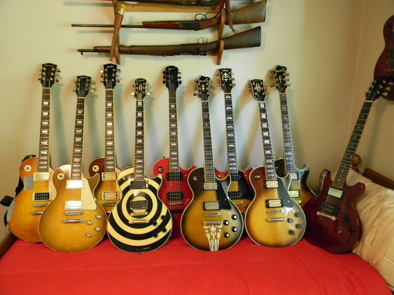 Guitars on a red bed