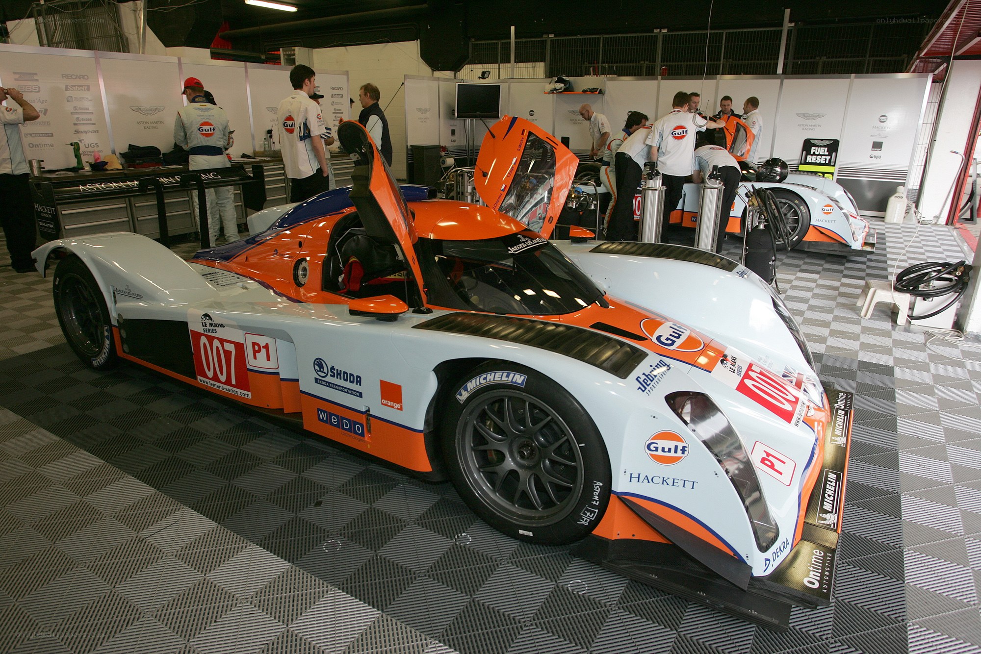 Gulf racing car in pit garage