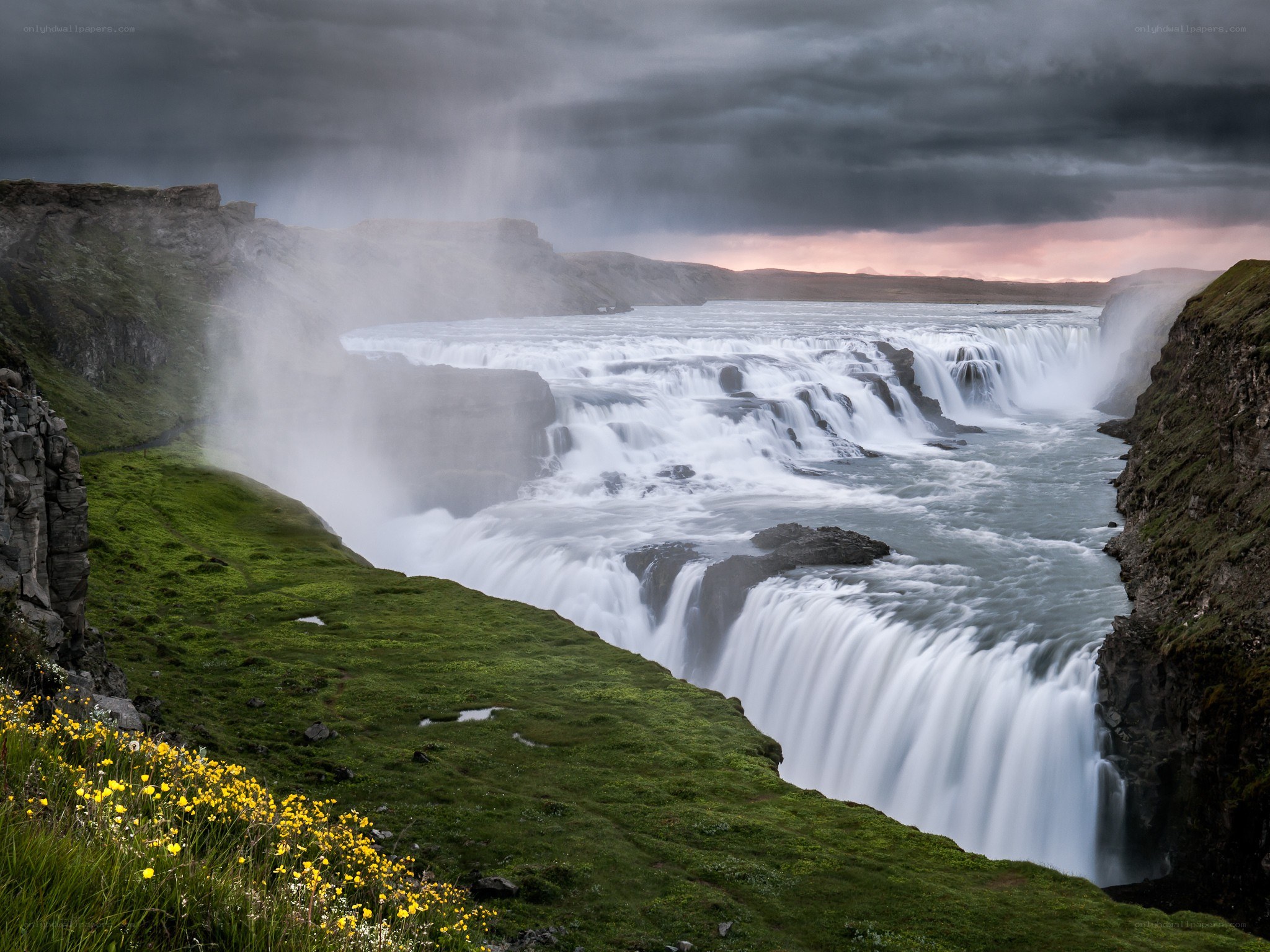 Gullfoss waterfall under stormy sky