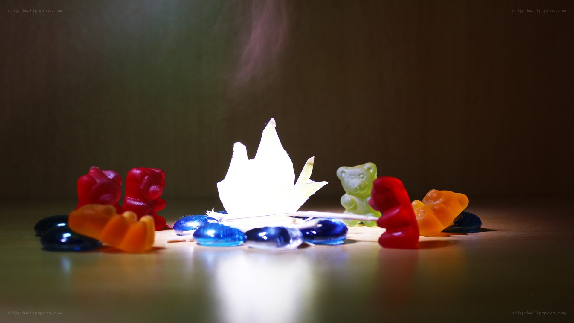 gummy bears around a campfire