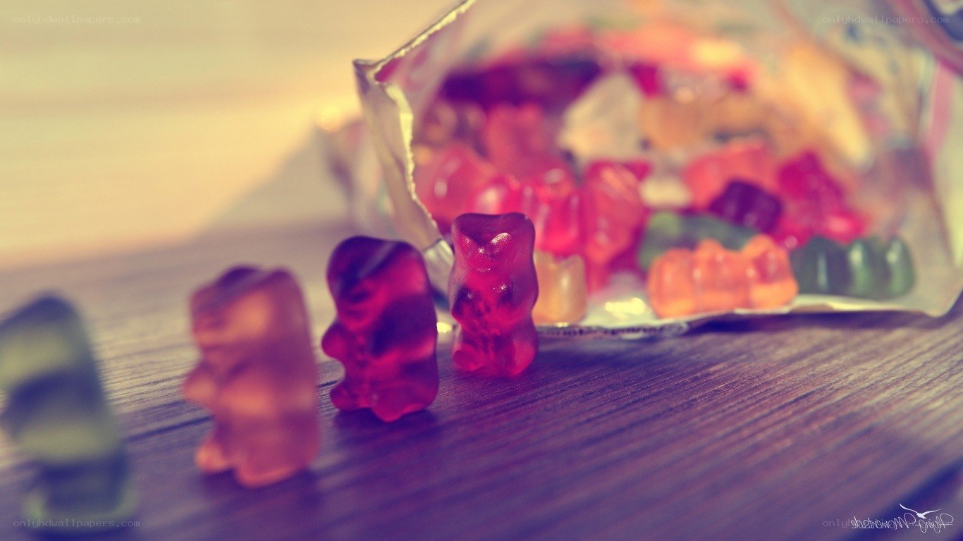 gummy bears on a wooden table