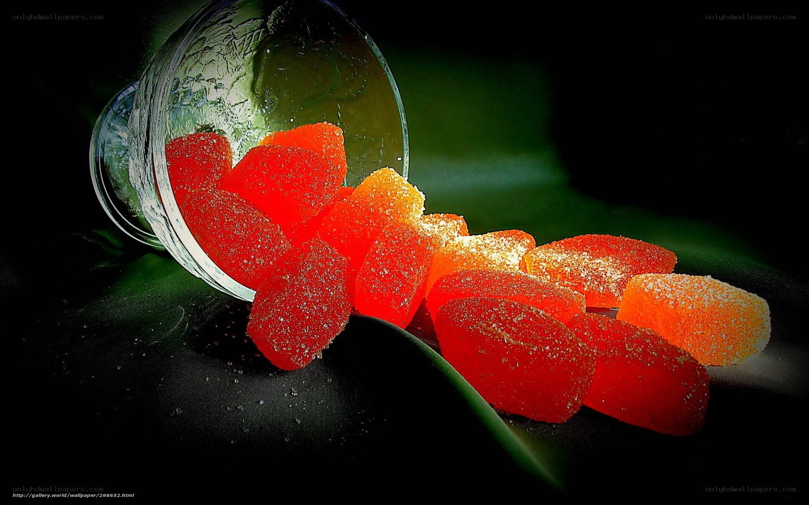 gummy candies spilling from glass