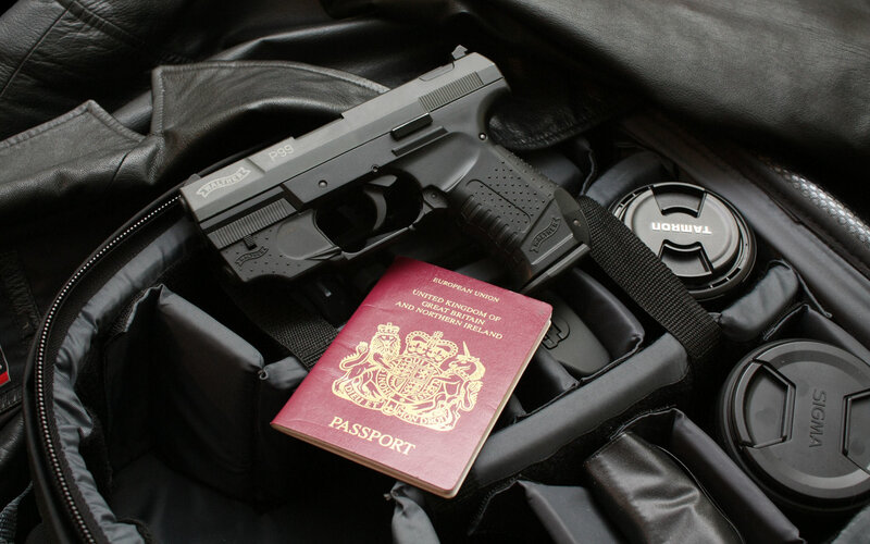 Gun and Passport in Bag — Black