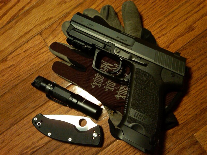 Gun and tactical gear on floor