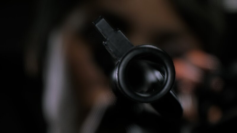 Gun Barrel View — Black, Tense