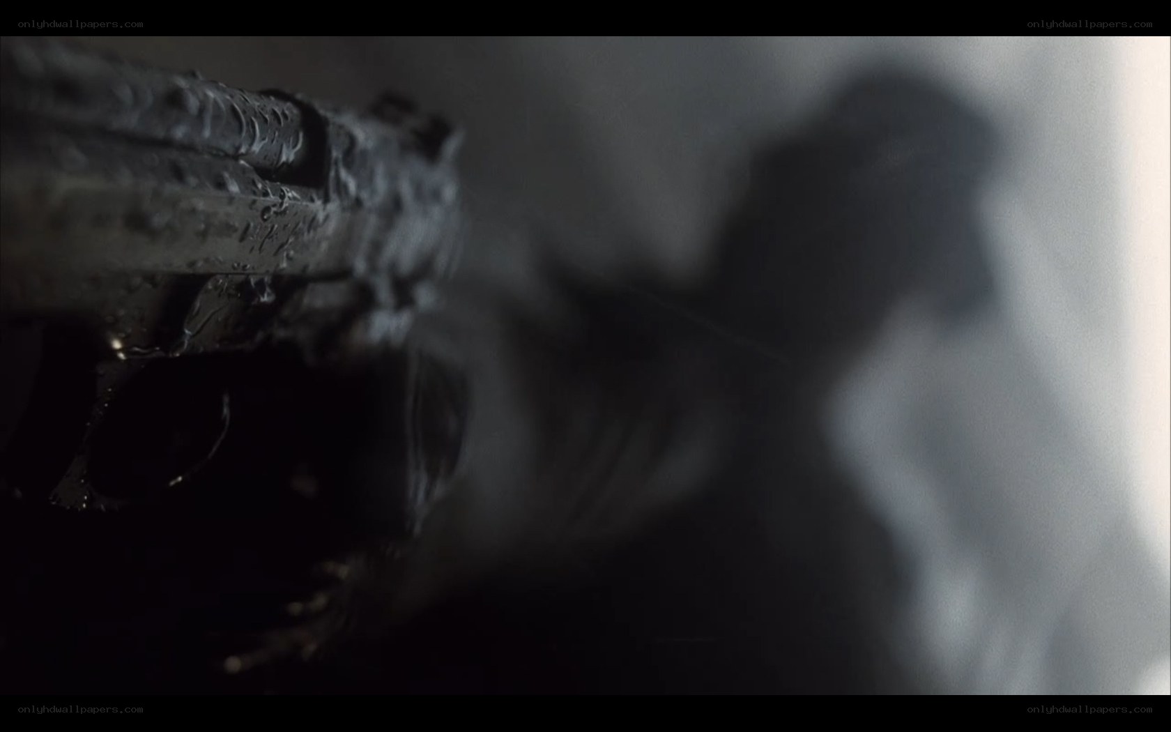 gun in dark setting