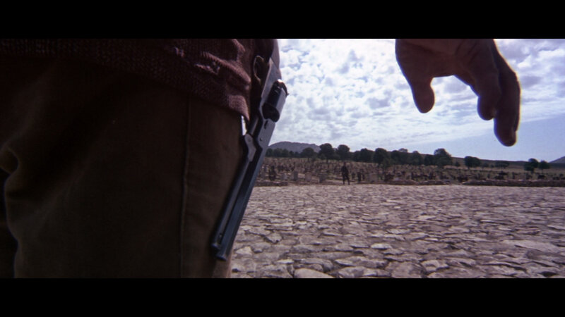 gun in holster at cemetery