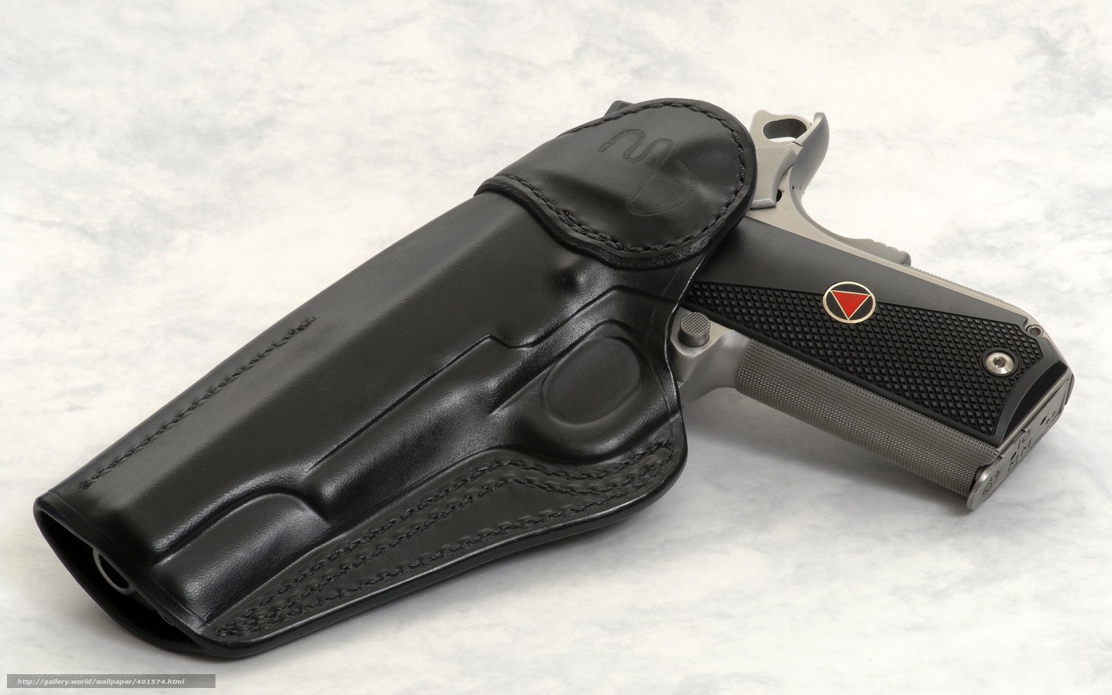gun in leather holster