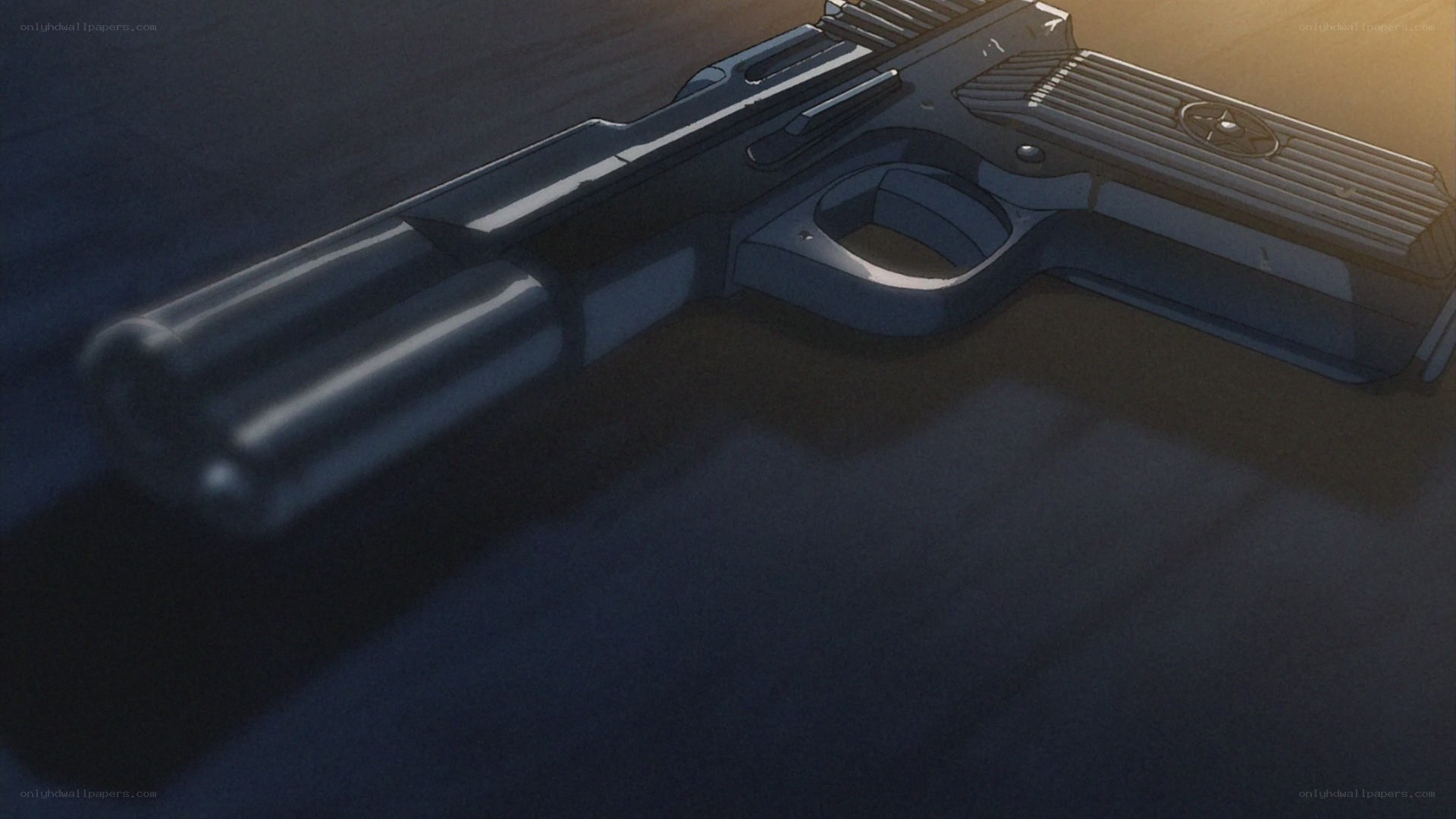 gun on dark surface