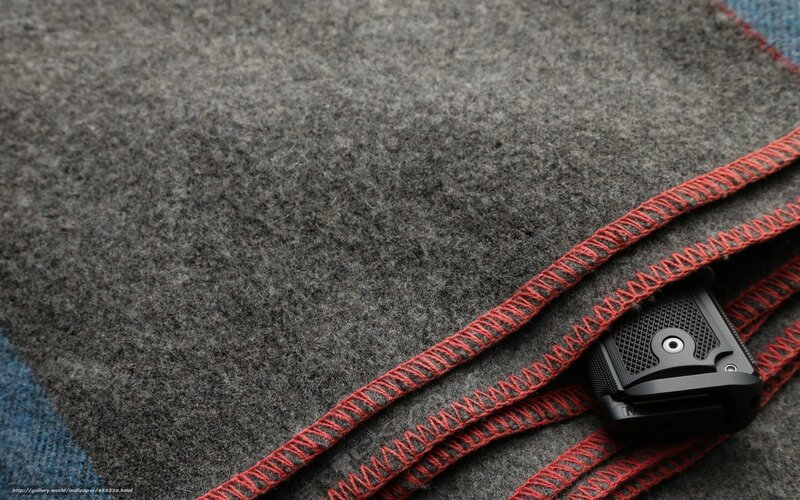 gun on folded blanket