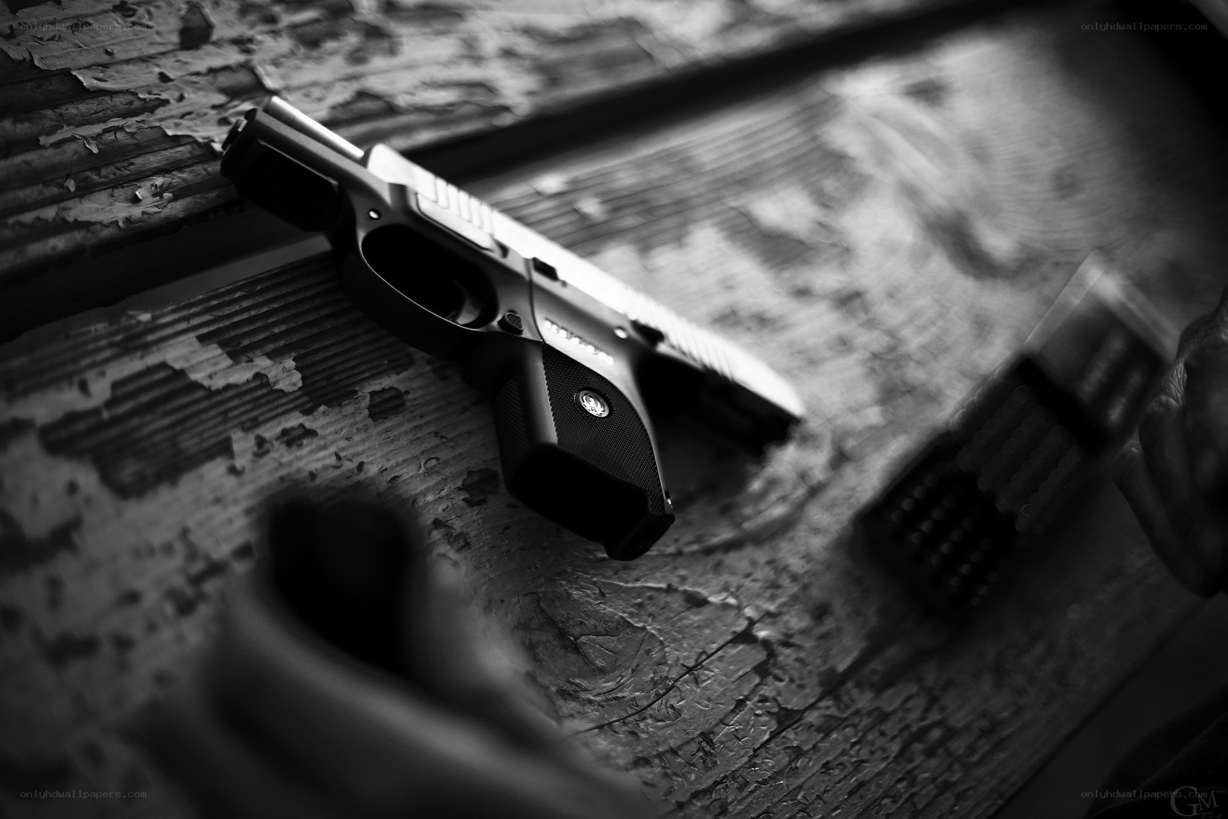 gun on weathered wood surface