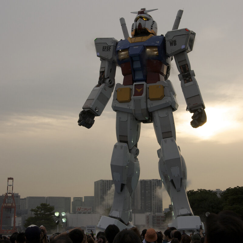 Gundam robot statue at sunset