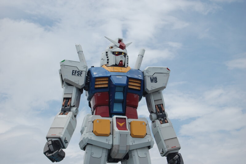 Gundam Robot Statue — White, Dramatic, Afternoon