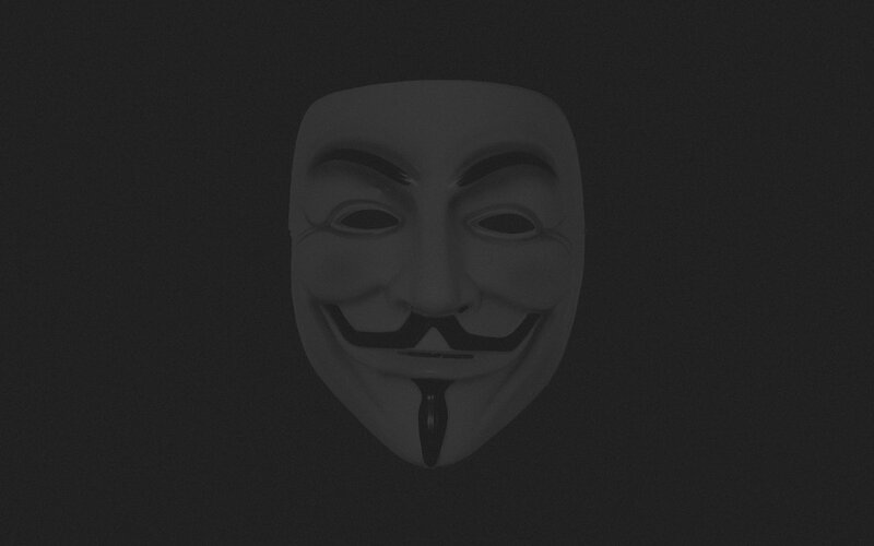 Guy Fawkes mask on dark background