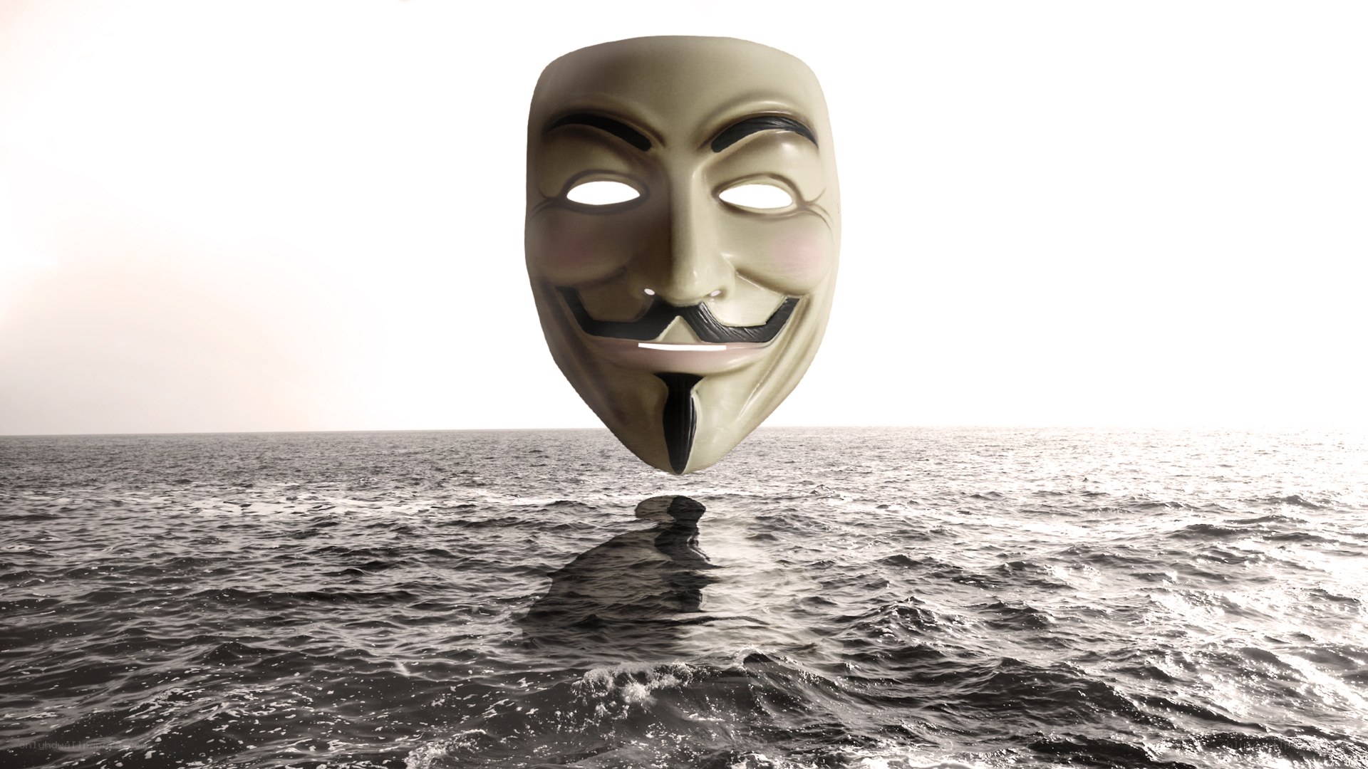 Guy Fawkes mask over ocean