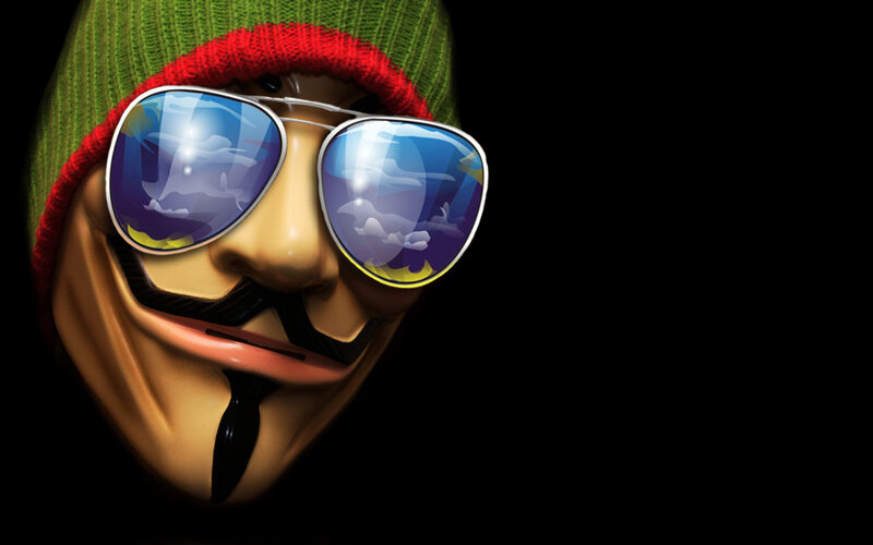 Guy in Guy Fawkes mask