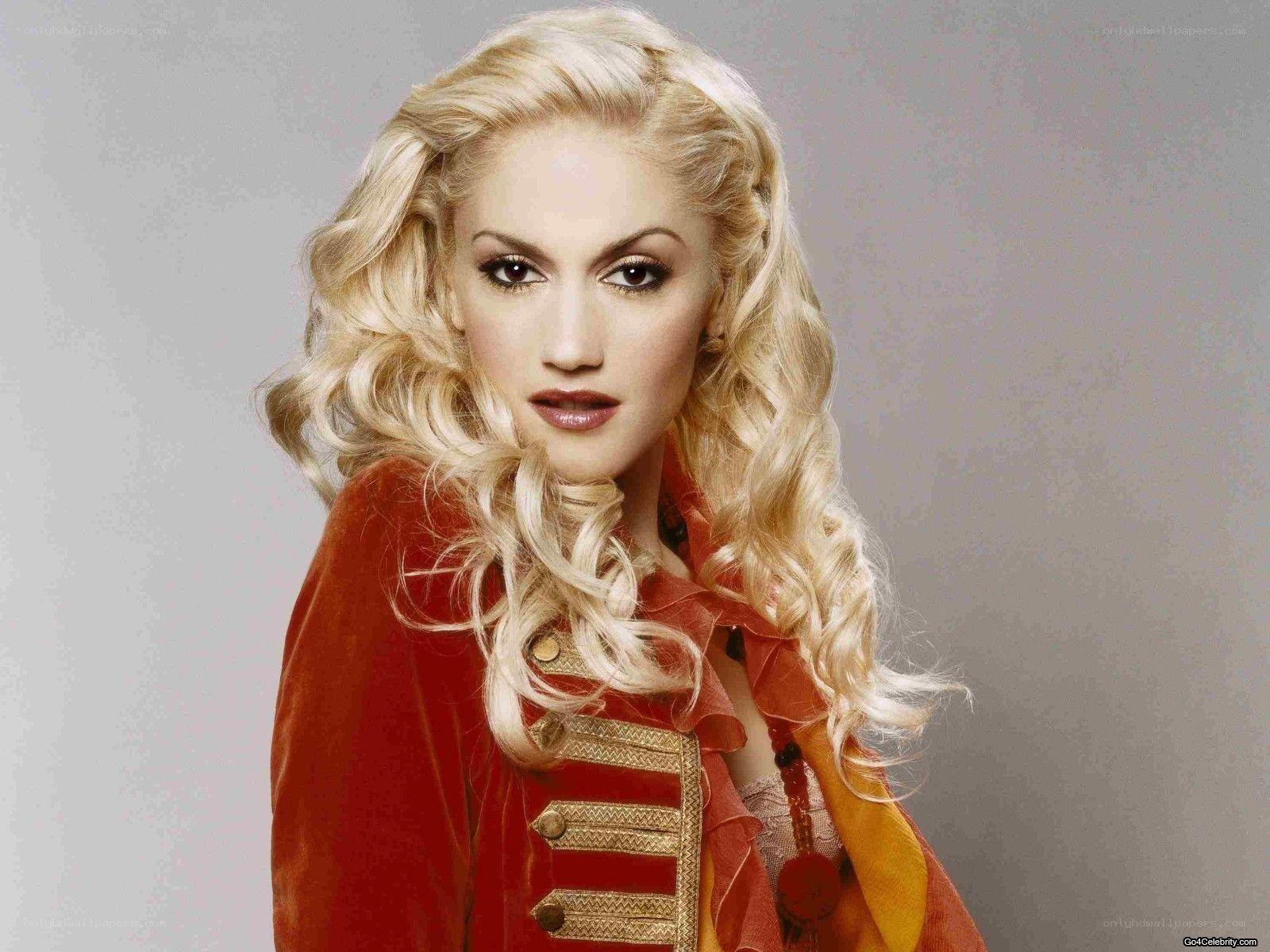 Gwen Stefani in red jacket