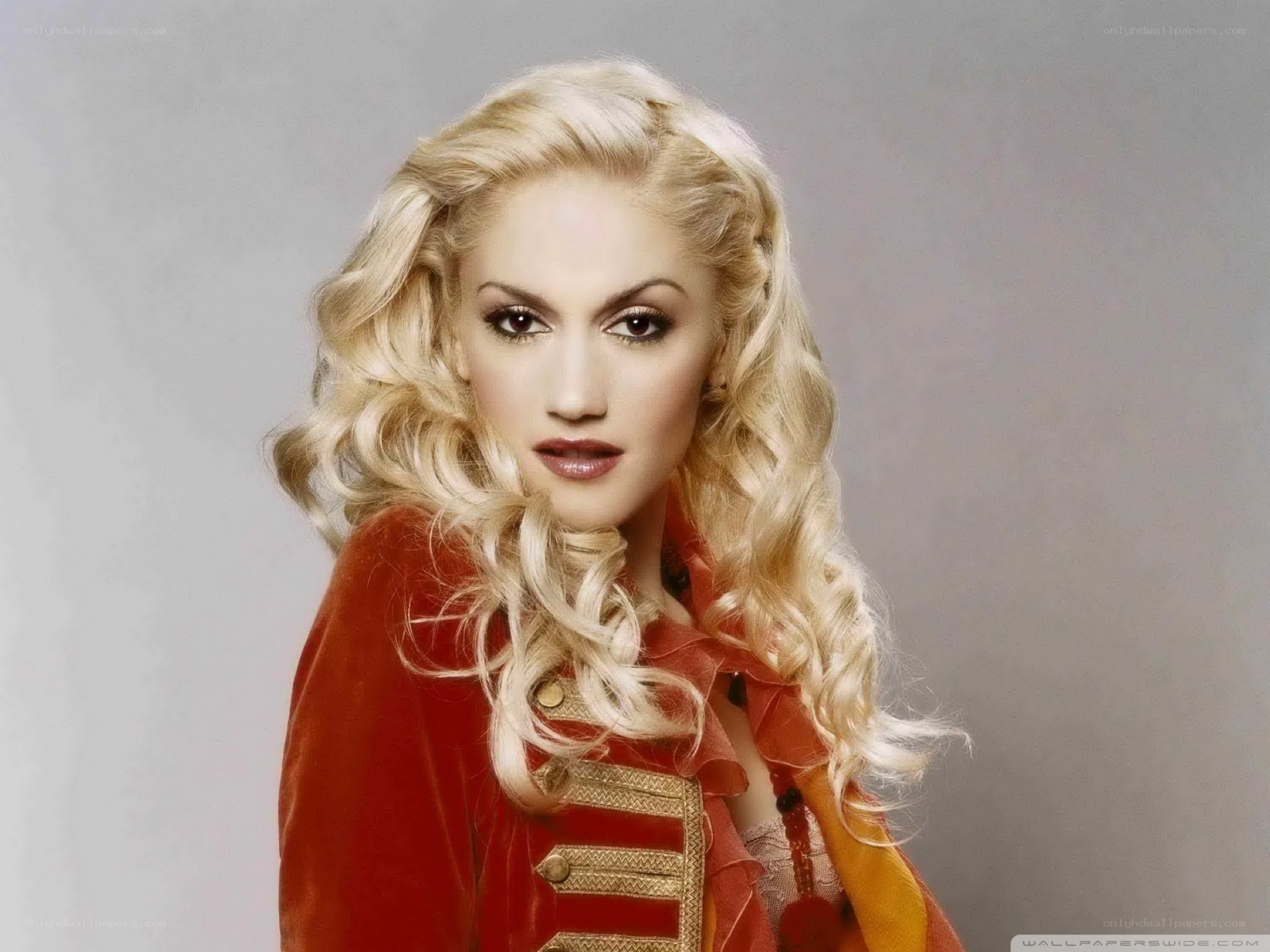 Gwen Stefani in red jacket