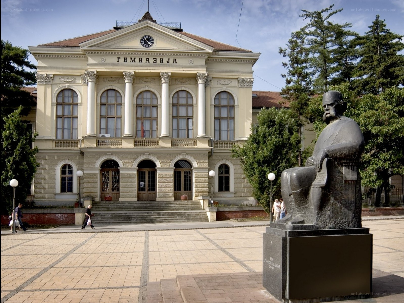 Gymnasium building with statue