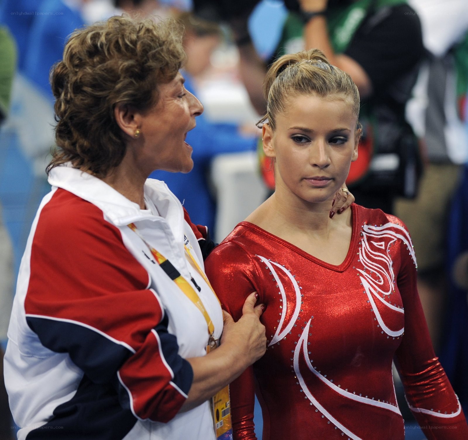 Gymnast and coach after competition