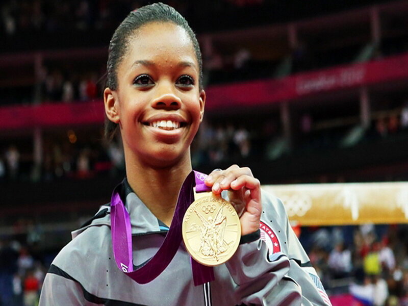 Gymnast Holding Medal