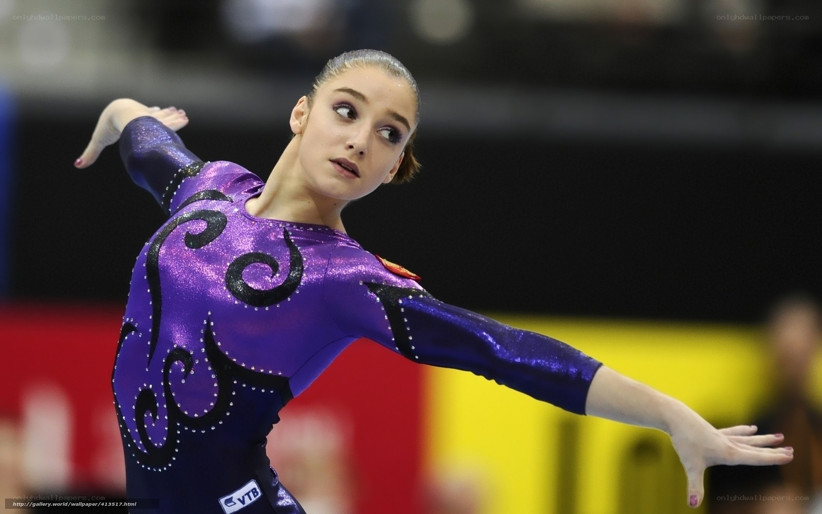 gymnast in purple leotard