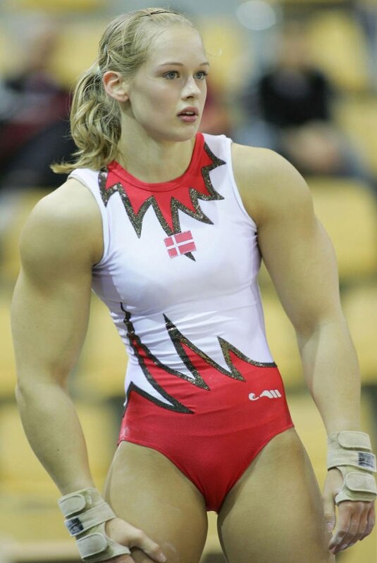 gymnast in red and white leotard